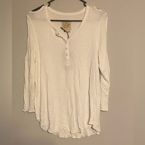 Chaser brand white long sleeve shirt with cut outs.